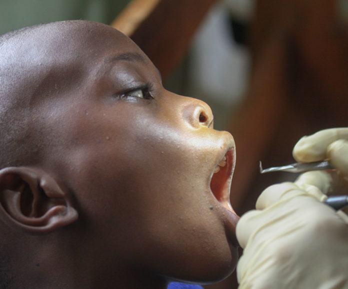 A child receiving dental healthcare